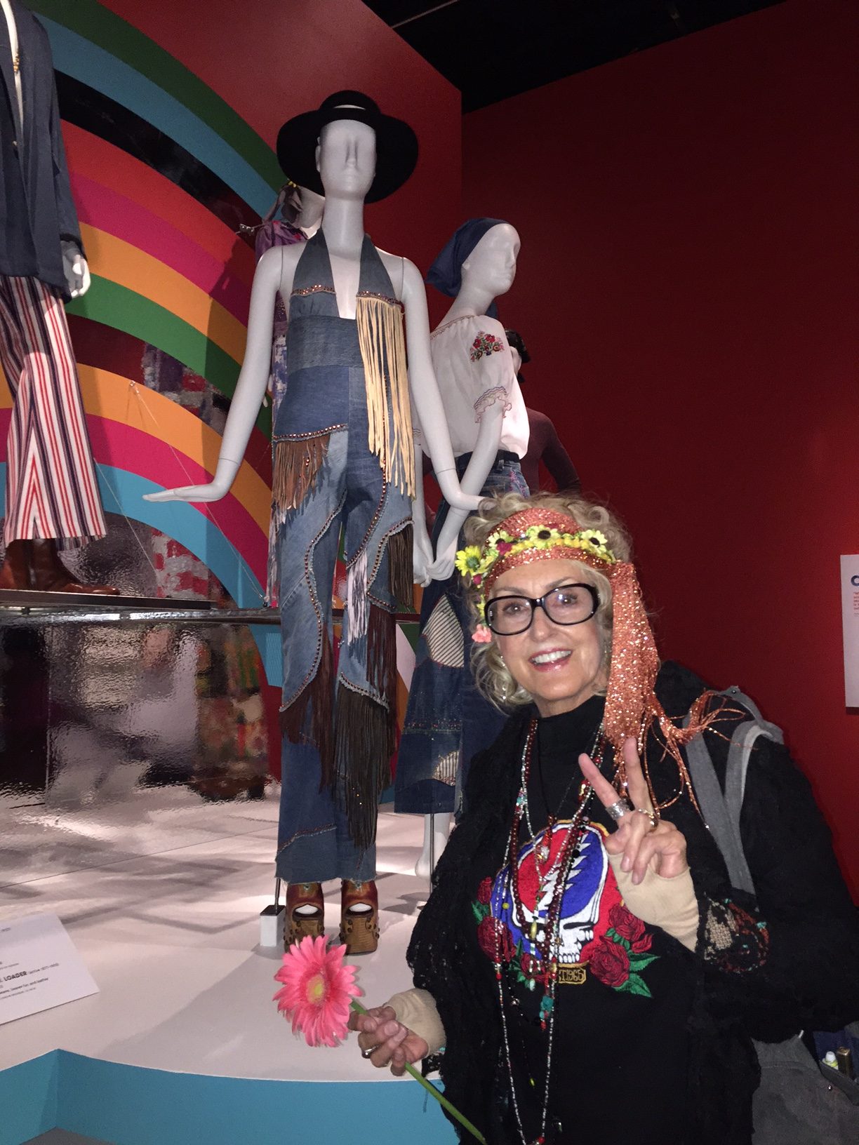 Linda Garth with her exhibit ensemble.